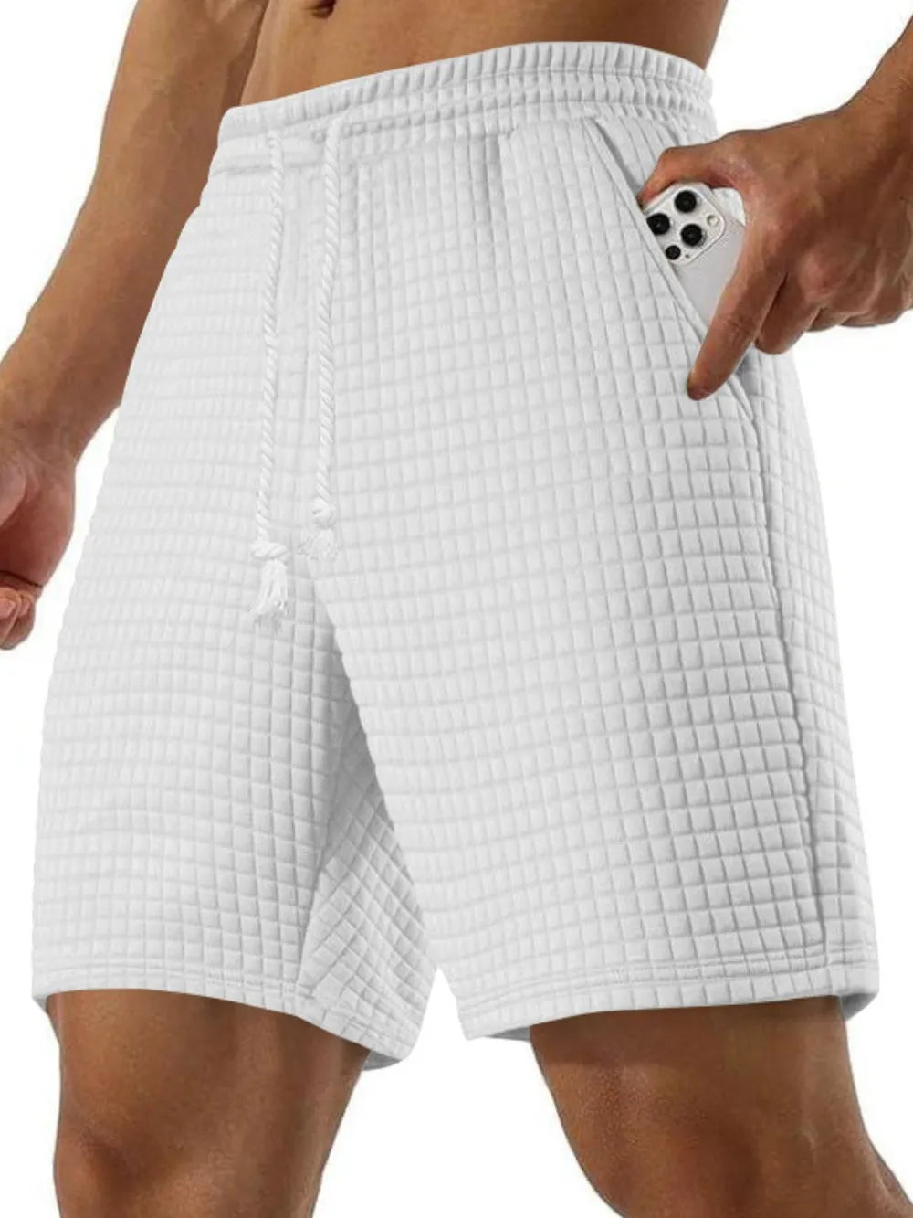 Men's textured drawstring casual shorts, white with elastic waistband and tassel ties.