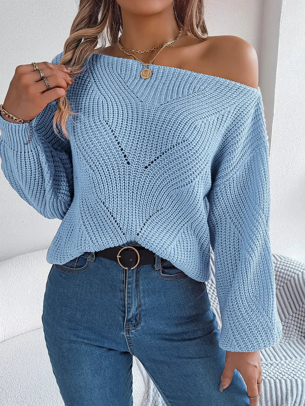 Openwork long-sleeve sweater in misty blue, textured openwork front with diagonal pattern