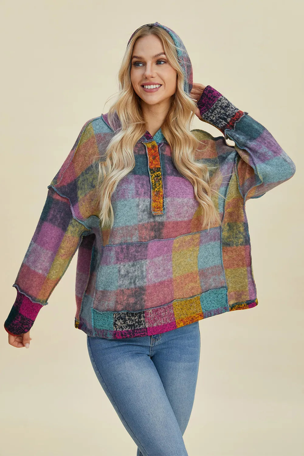 Multicolor plaid fleece hoodie with hood, half-zip placket, dropped shoulders, 3/4 view