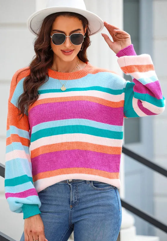 Multicolor striped round-neck sweater with long sleeves, ribbed cuffs, and relaxed drop shoulders.