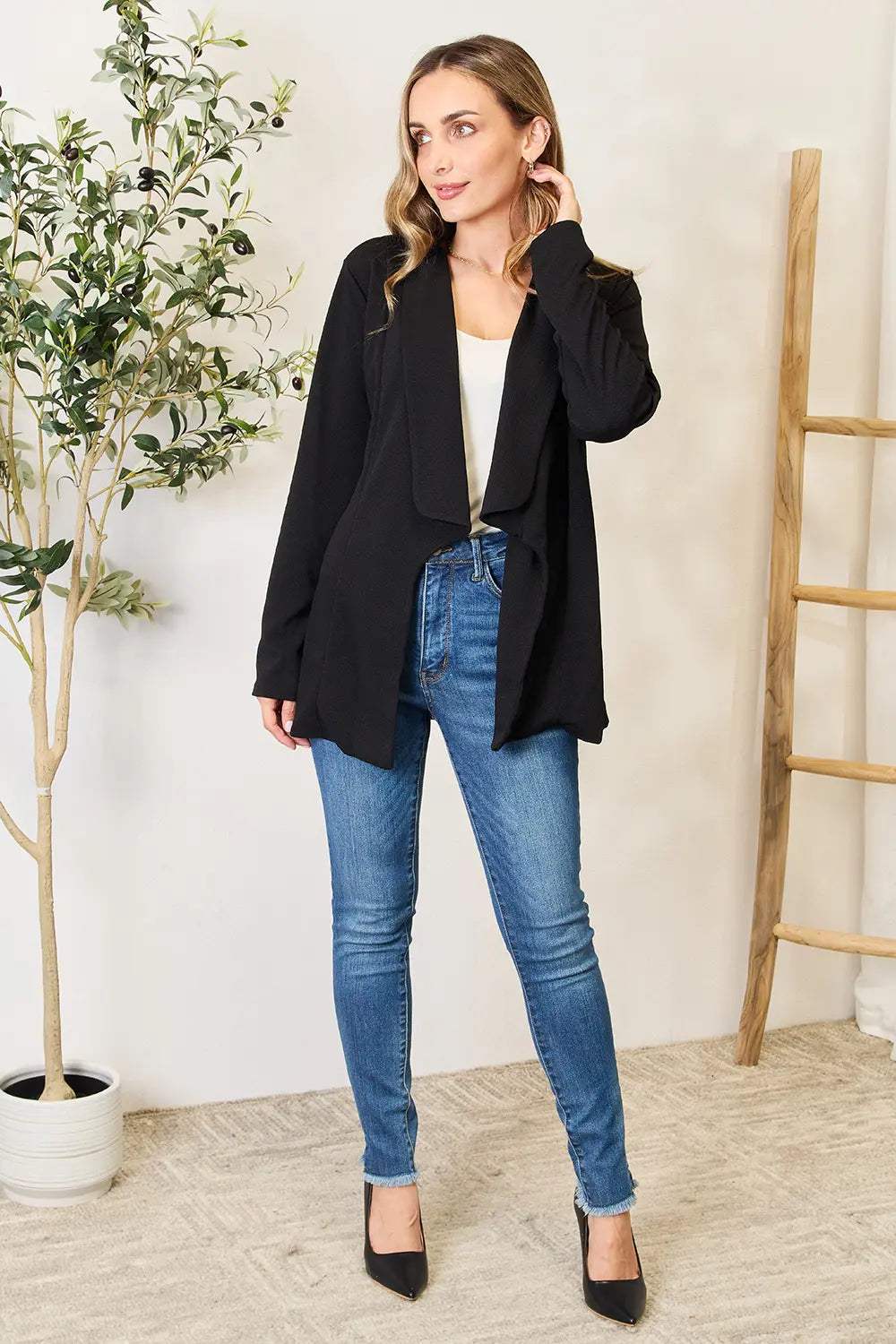 Black open-front long blazer over jeans, full length sleeves and notch collar