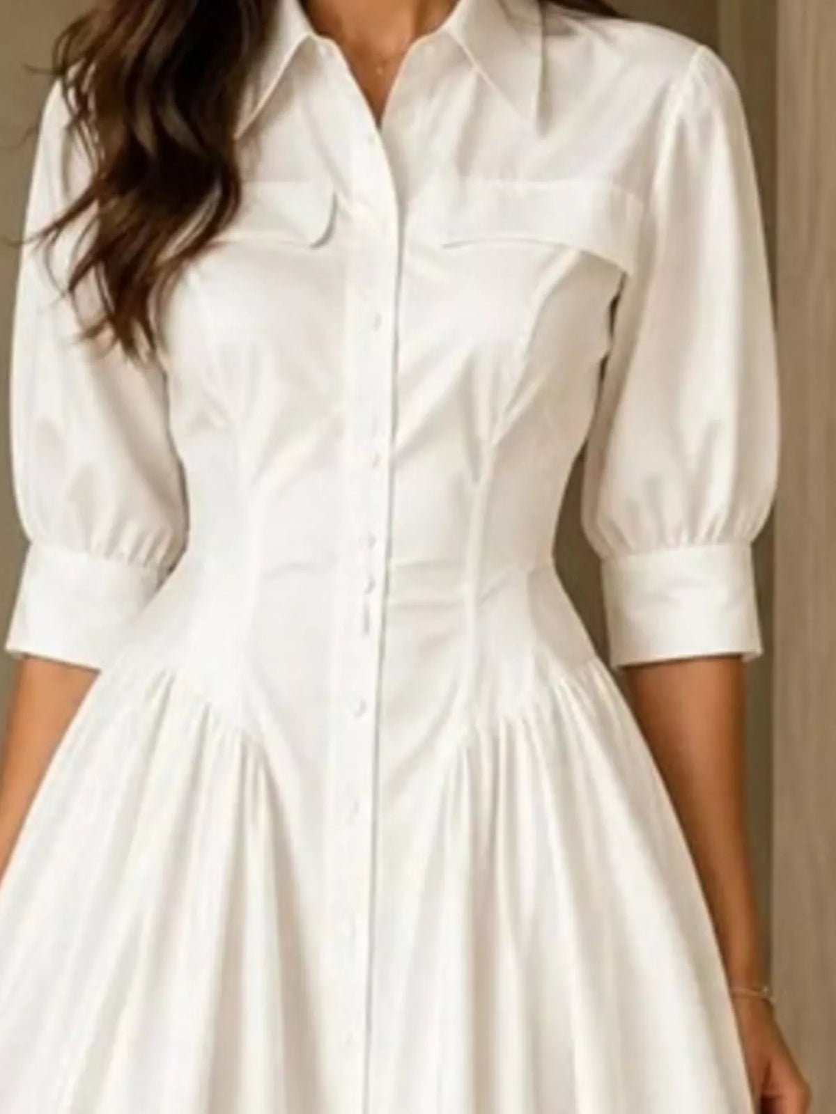 White button-down shirt dress close-up with gathered waist and 3/4 sleeves