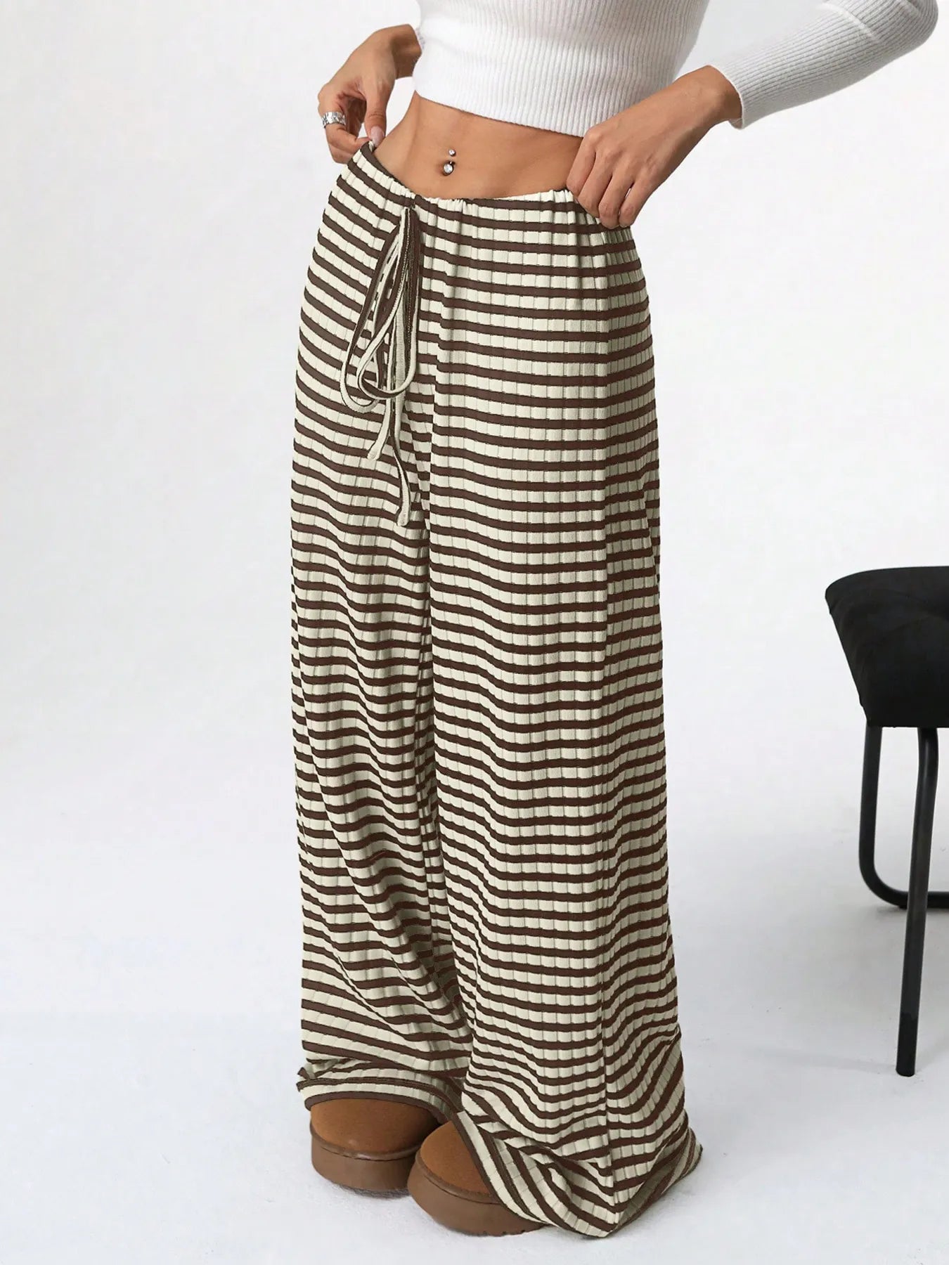 Striped wide-leg drawstring pants, dark and beige striped fabric, adjustable drawstring