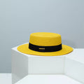 Cedar & Moore Straw Boater Hat with Band, yellow straw, black ribbon, Trendsi