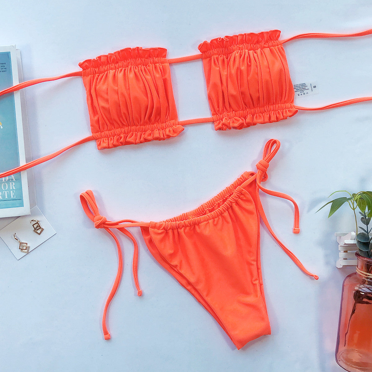 Bright orange ruched bikini top and high-leg side-tie bikini bottom set
