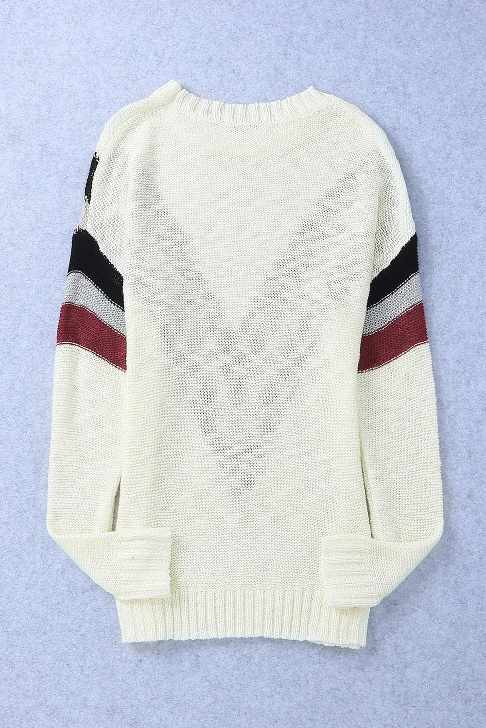 Cream chevron knit sweater back, black and burgundy stripe accents on sleeves