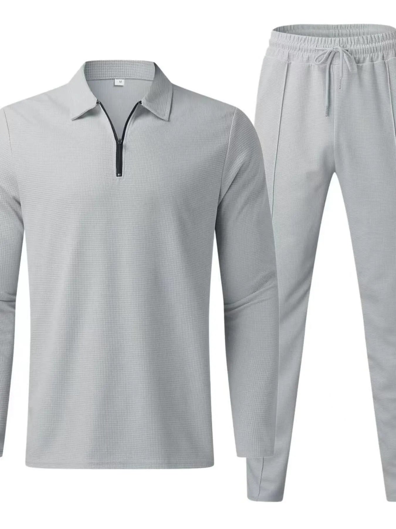 Light gray long-sleeve quarter-zip top and matching jogger pants set