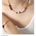 Freshwater pearl and tiger eye bead necklace in gold with dark accent beads