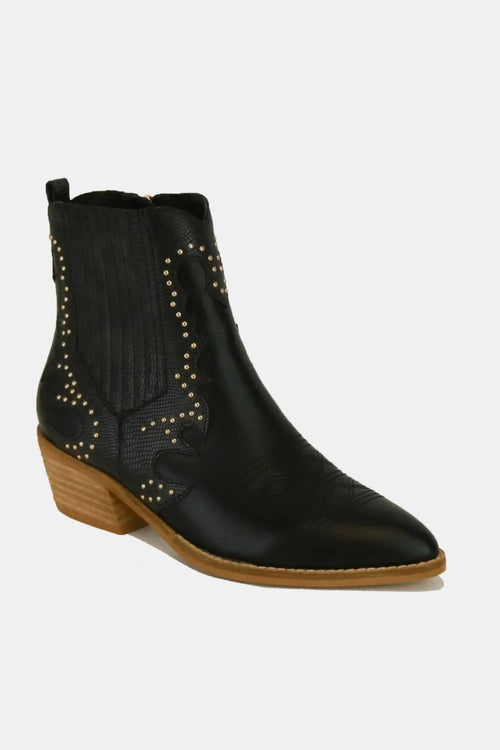 Black point-toe ankle boots with studded side panels and low block heel