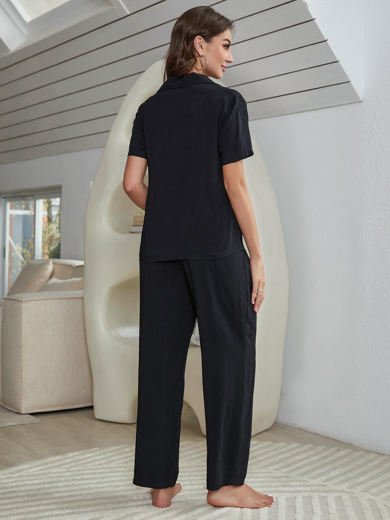 Black lounge set back view: short-sleeve button shirt and drawstring wide-leg pants