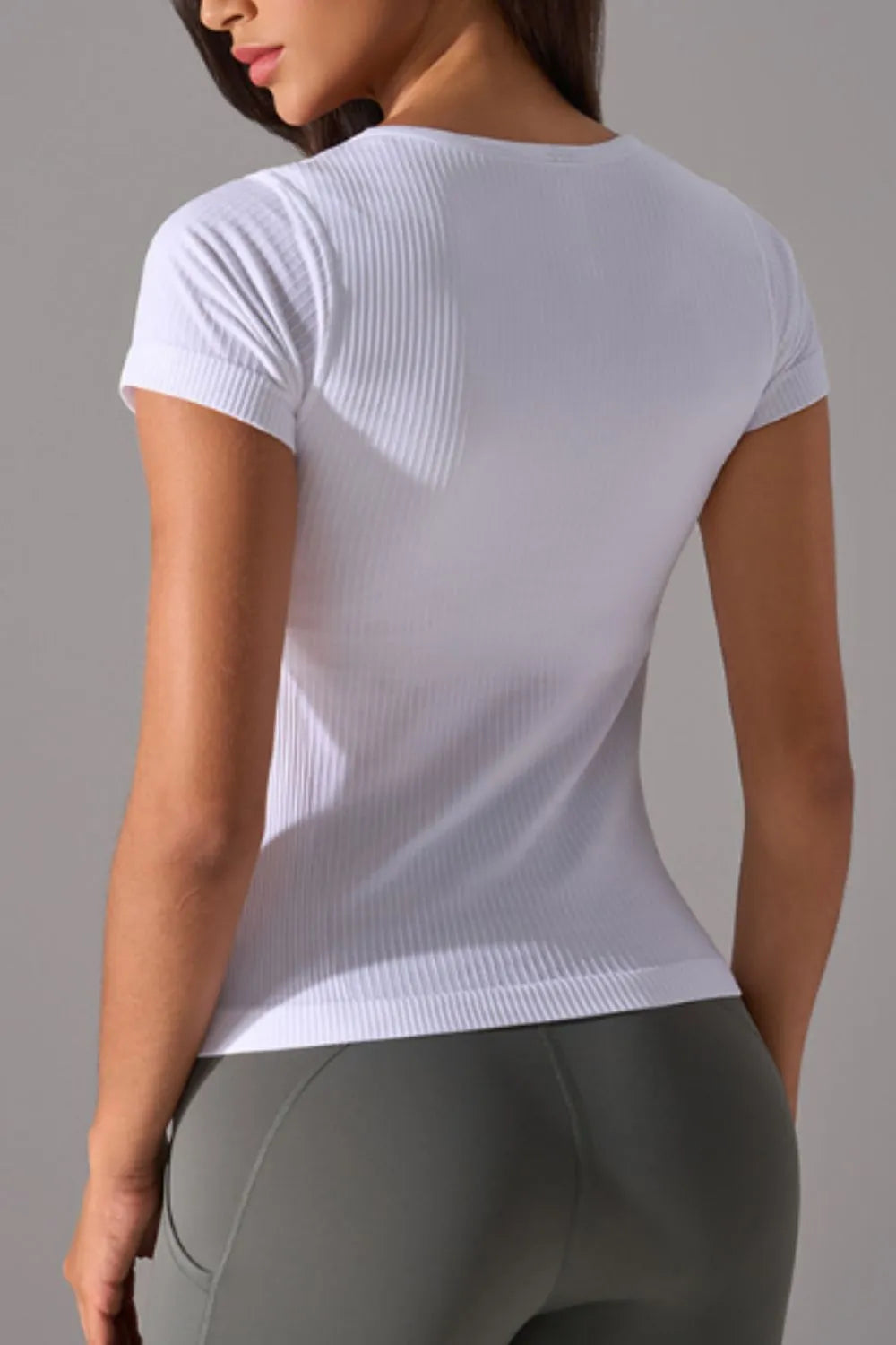 White active t-shirt back view with short sleeves and ribbed knit