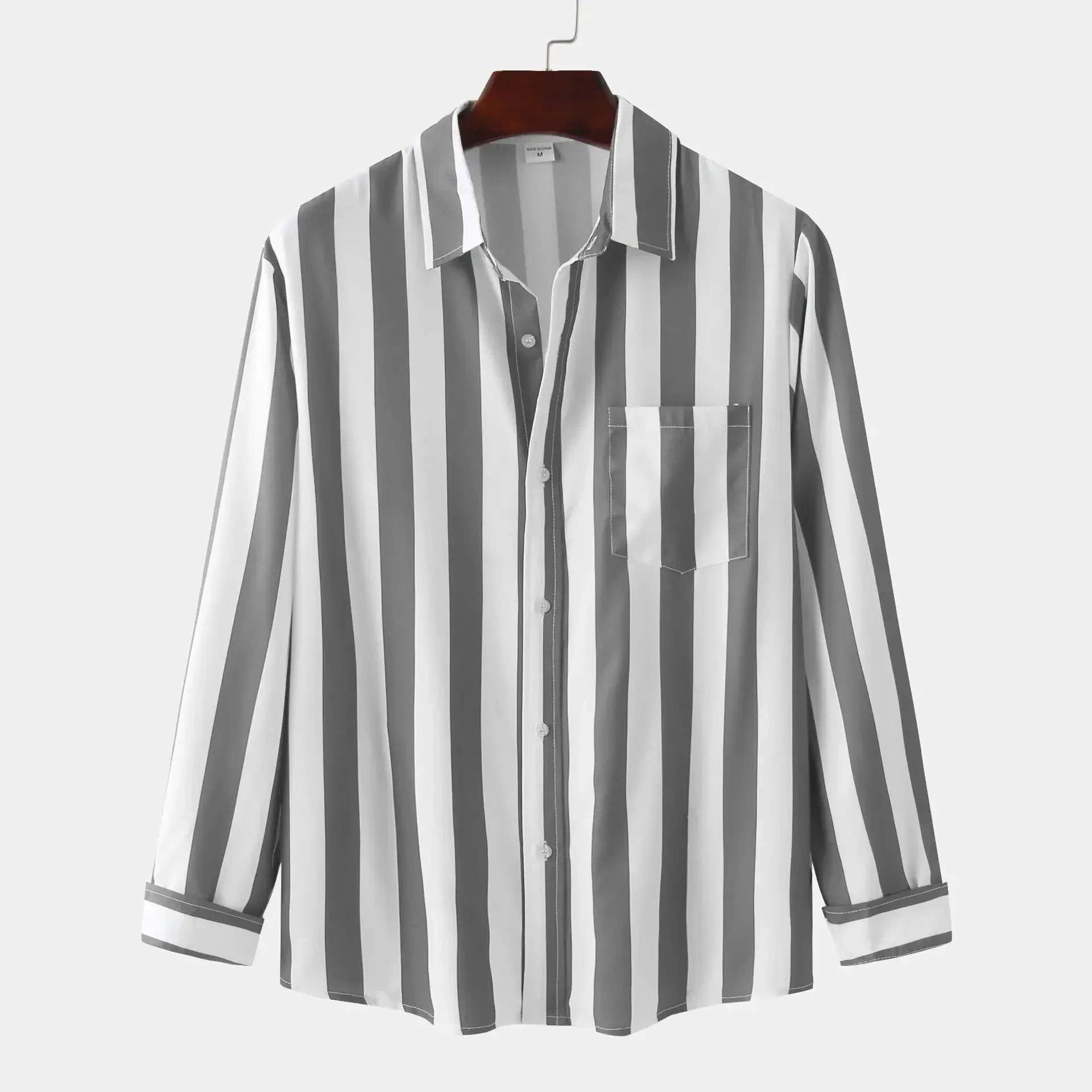 Grey striped long-sleeve button-down shirt on hanger, front placket and chest pocket