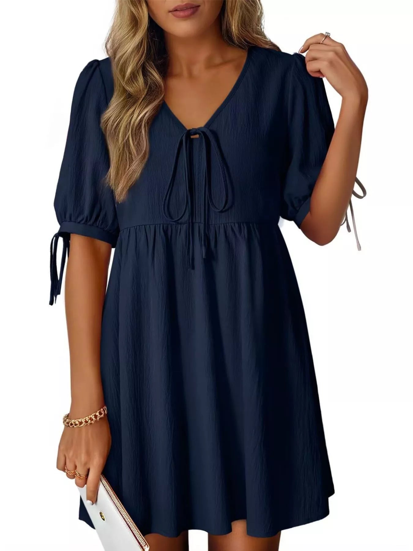 Tie-Neck Puff Sleeve A-Line Mini Dress in navy with front tie neckline.