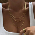 Gold-plated three-layer chain necklace with two rope chains and one smooth chain