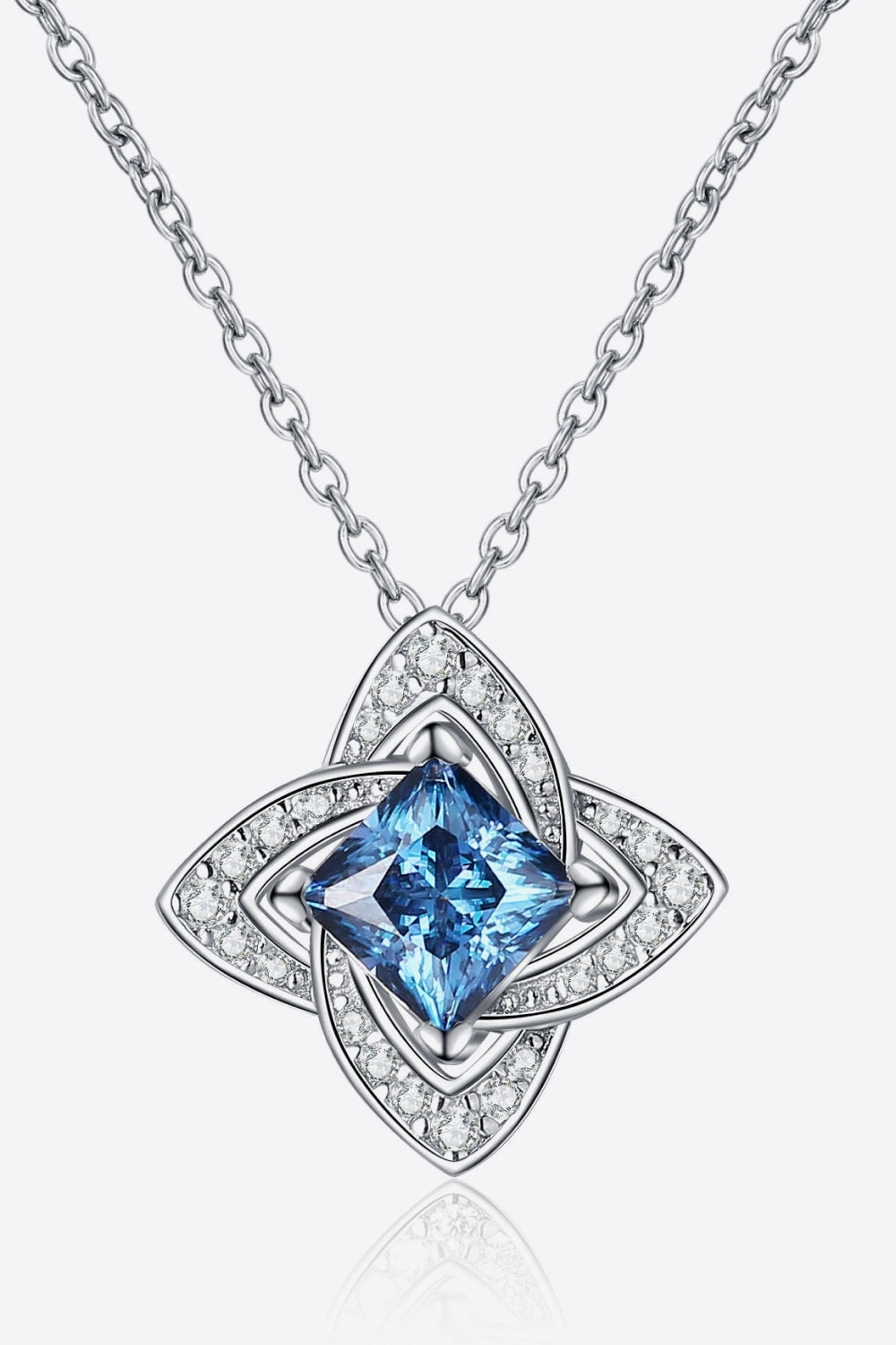 Silver-tone floral pendant necklace with sky-blue moissanite center and halo stones
