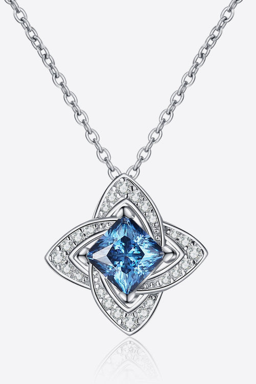 Silver-tone floral pendant necklace with sky-blue moissanite center and halo stones