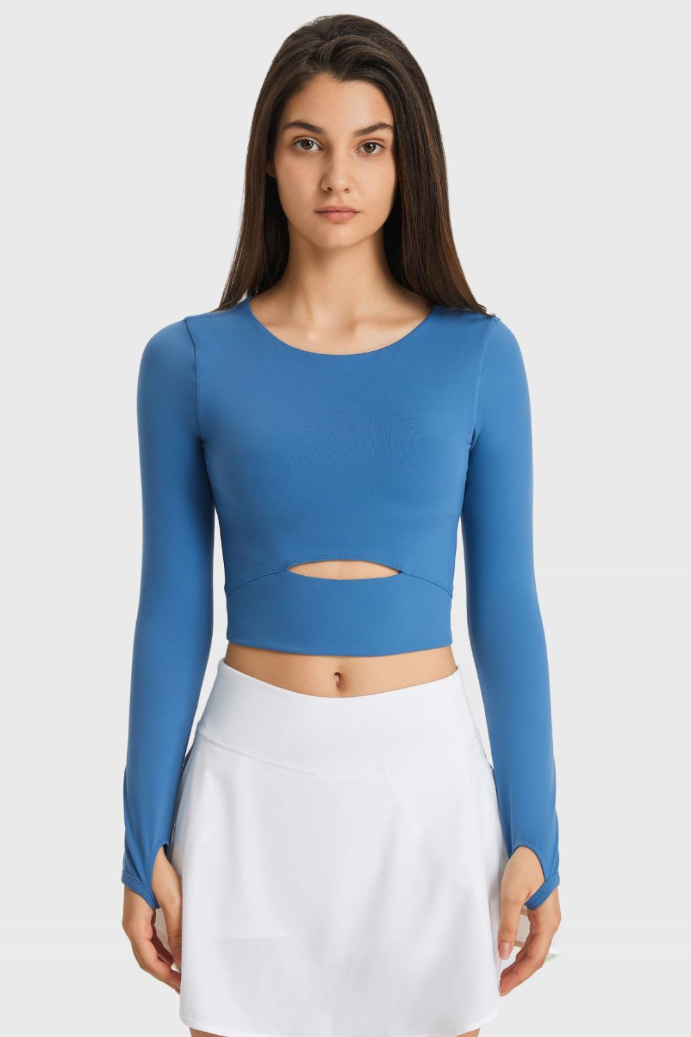 Blue long-sleeve cropped sports top with waist cutout