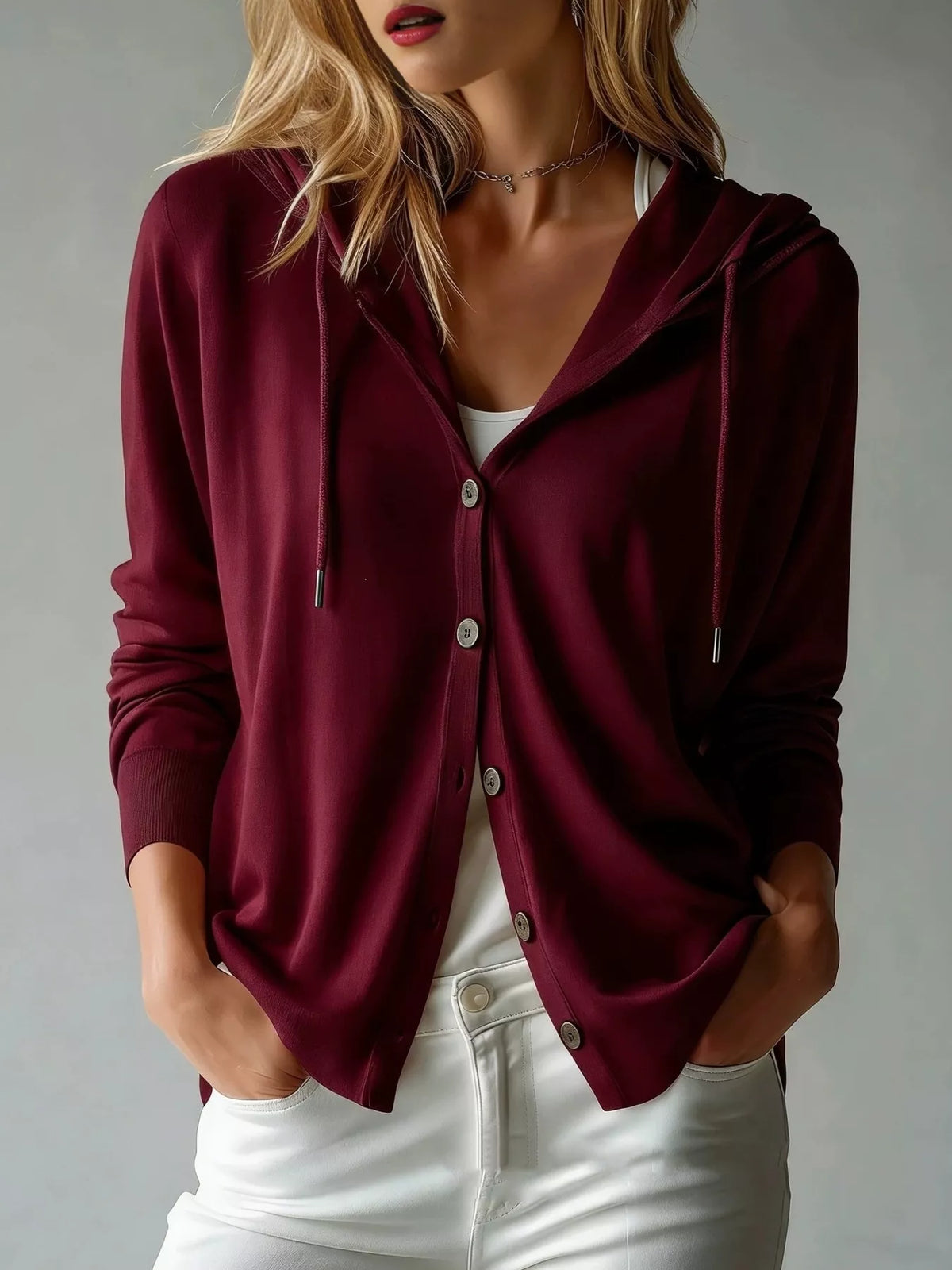 Burgundy hooded button cardigan with drawstring, front pockets, and long sleeves