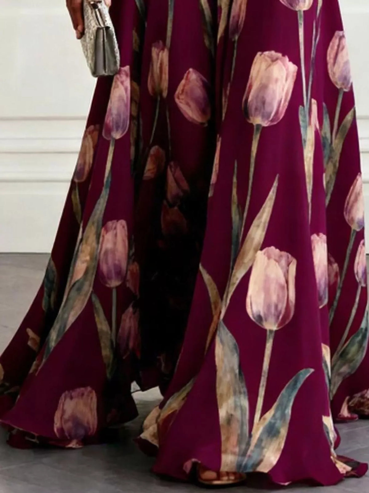 Sleeveless floral print ruched maxi dress in burgundy with pleated, flowing skirt