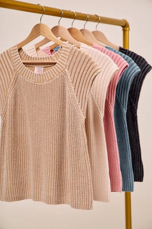 Sleeveless raglan knit sweater top on wooden hangers, ribbed crew neck; vintage taupe