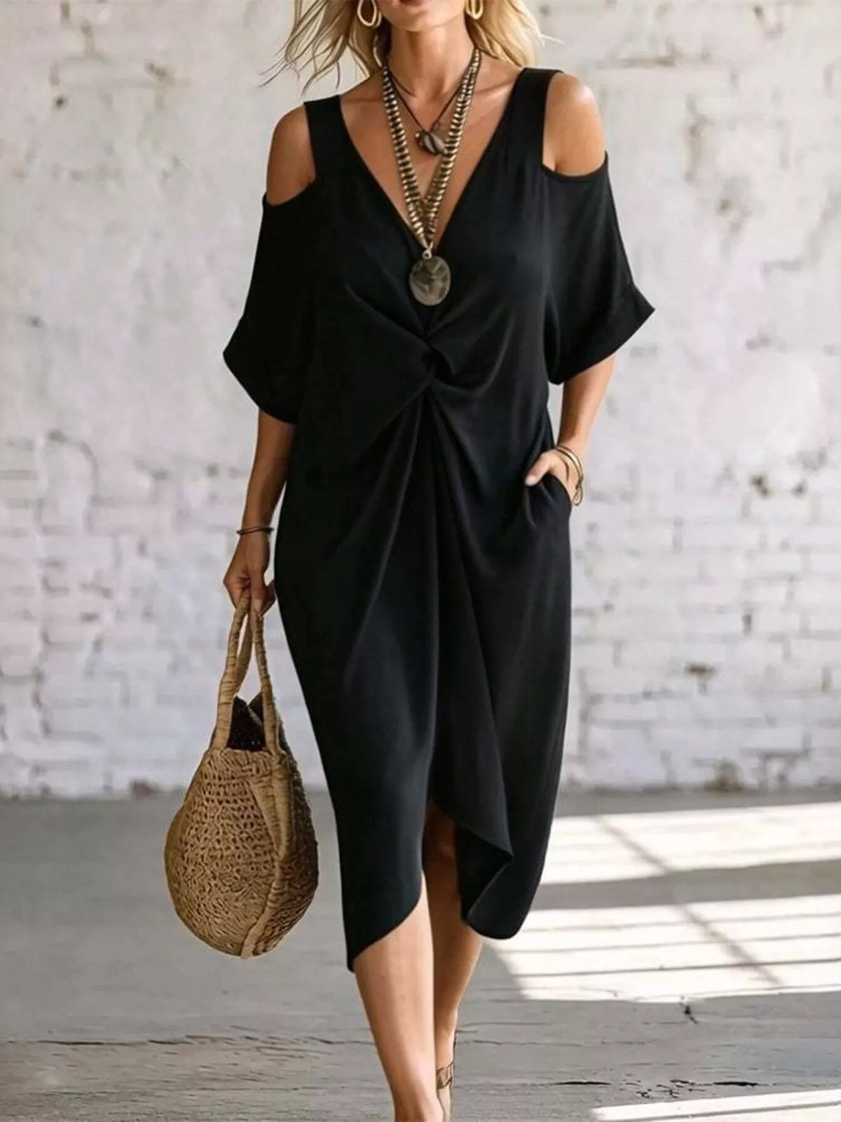 Black cold-shoulder twist midi dress with draped knot front and loose short sleeves