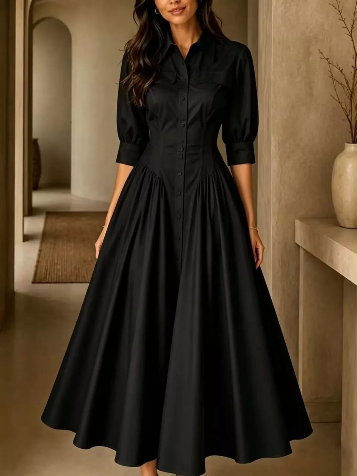 Black button-down shirt dress with cinched waist and full flared skirt