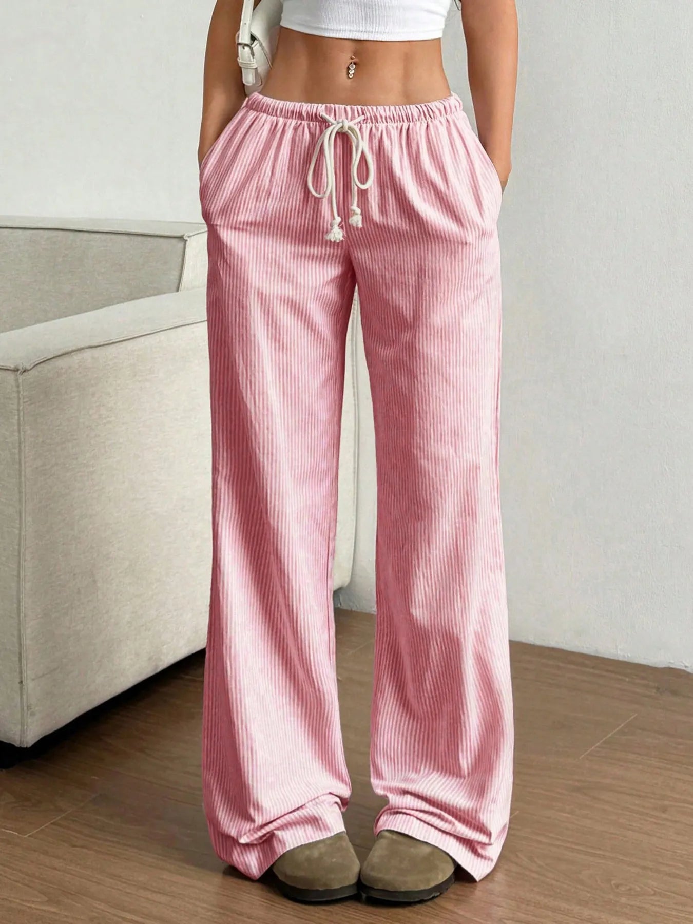 Pink striped wide-leg pants with drawstring elastic waistband and tassel ties