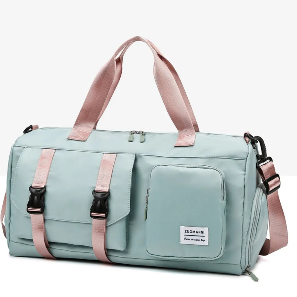 Large multi-pocket travel duffle bag in turquoise with front organizer pocket and crossbody strap