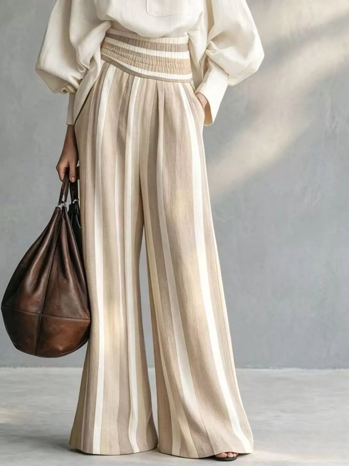 Cream striped wide-leg pants with smocked waistband and mock-neck top two-piece set