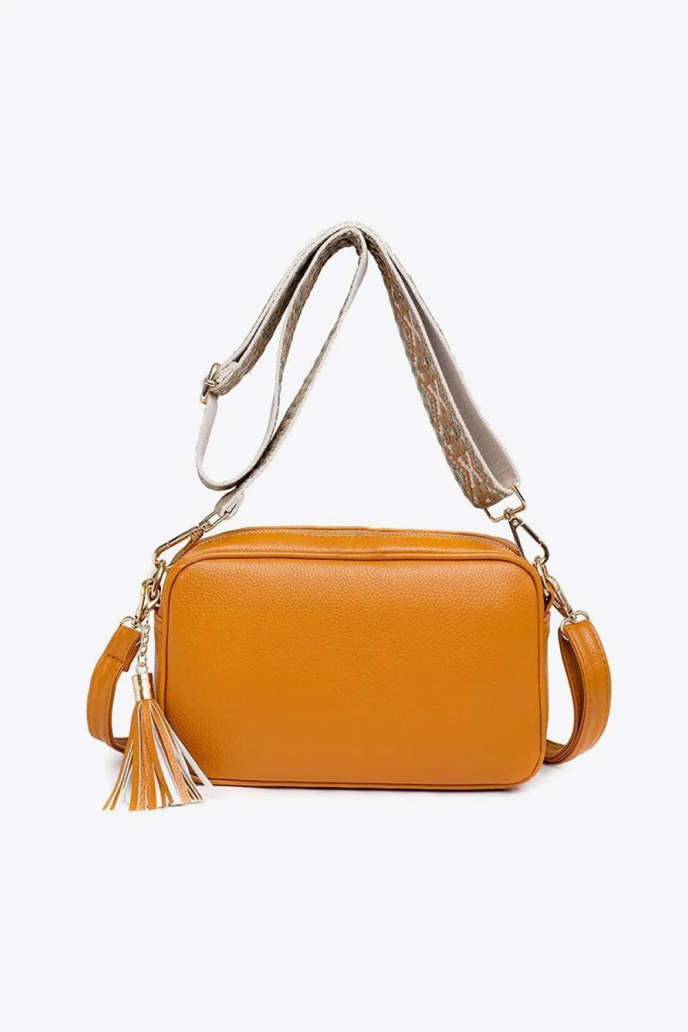 PU leather tassel crossbody bag, orange with tassel detail and adjustable shoulder strap