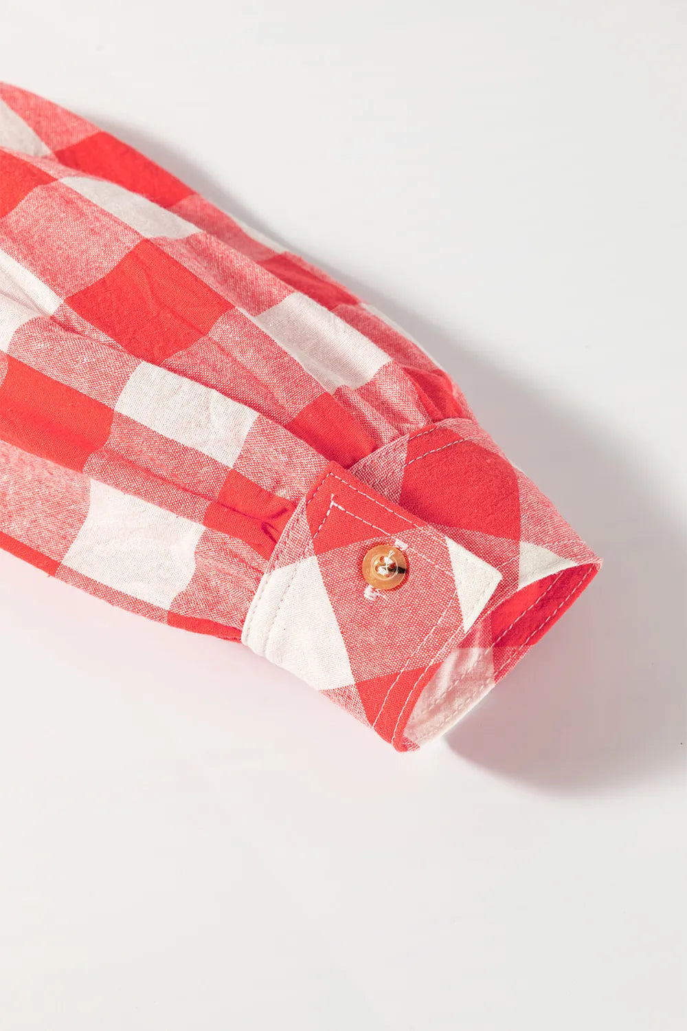 Strawberry plaid shirt dress sleeve cuff with button and gathered trim