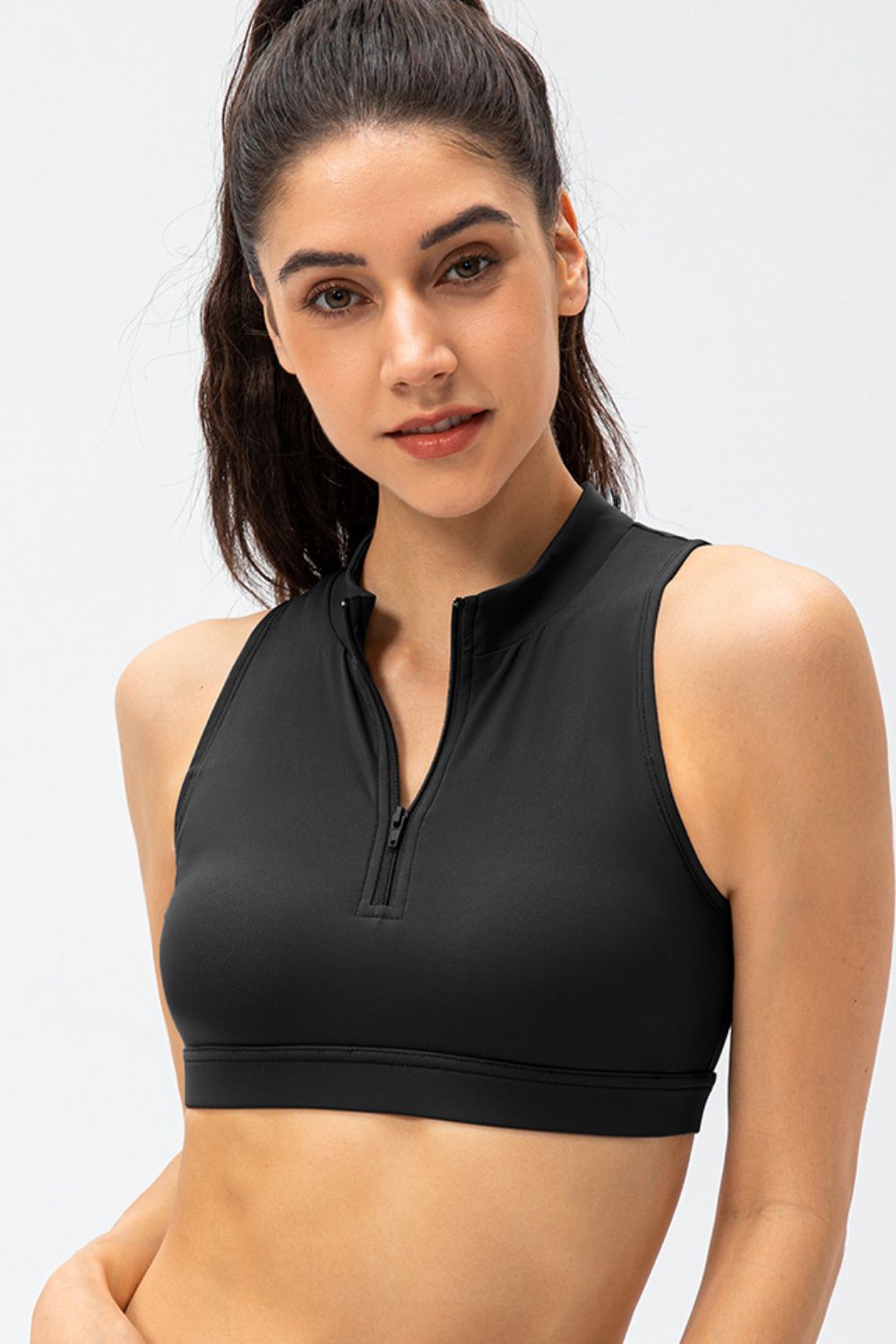 Black cropped active tank top with front half-zip and sleeveless high neckline