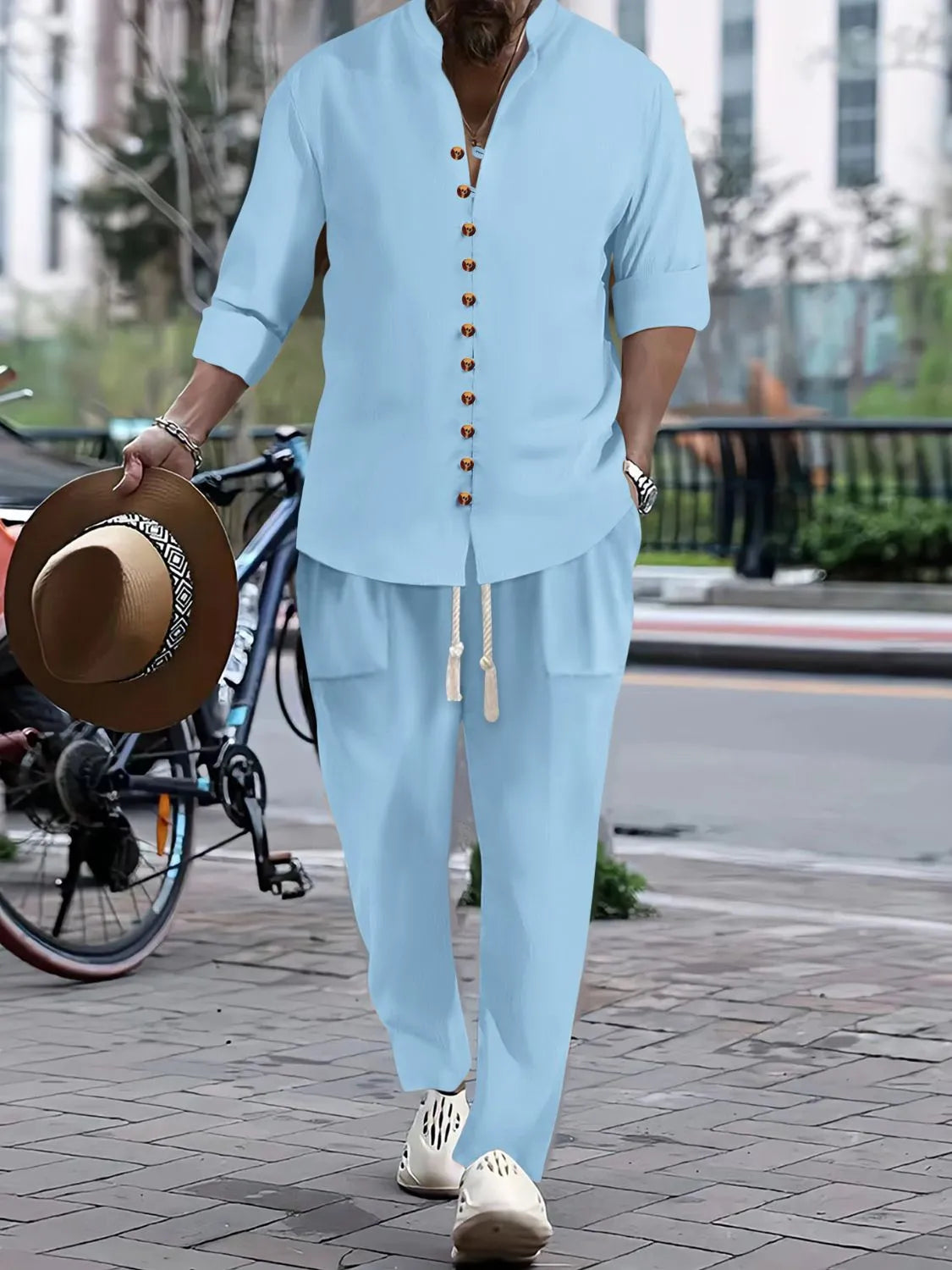 Men's light blue button-front long-sleeve shirt and pants set with gold buttons