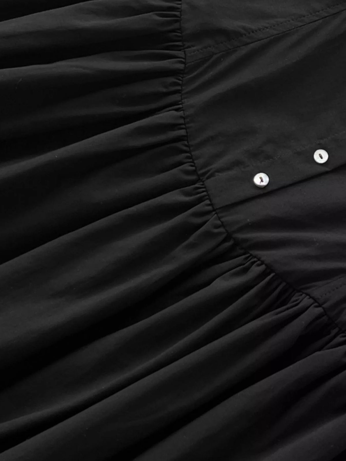 Black cotton maxi dress bodice with center buttons and ruffled, tiered skirt seams