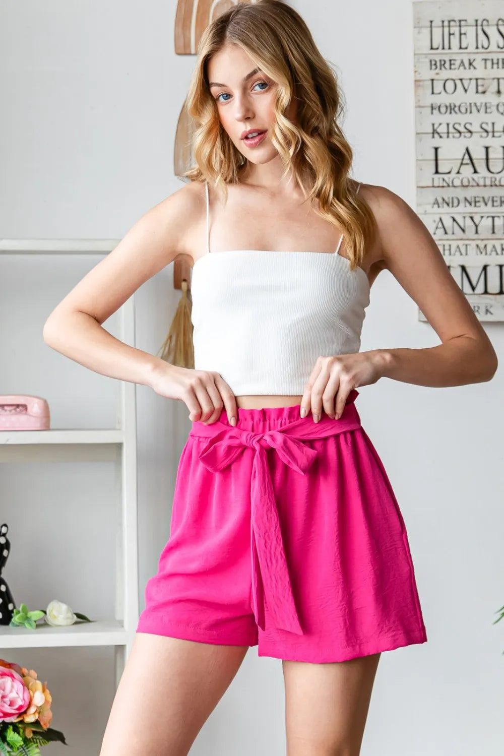 Fuchsia high-waist tied texture shorts with front bow and gathered waistband