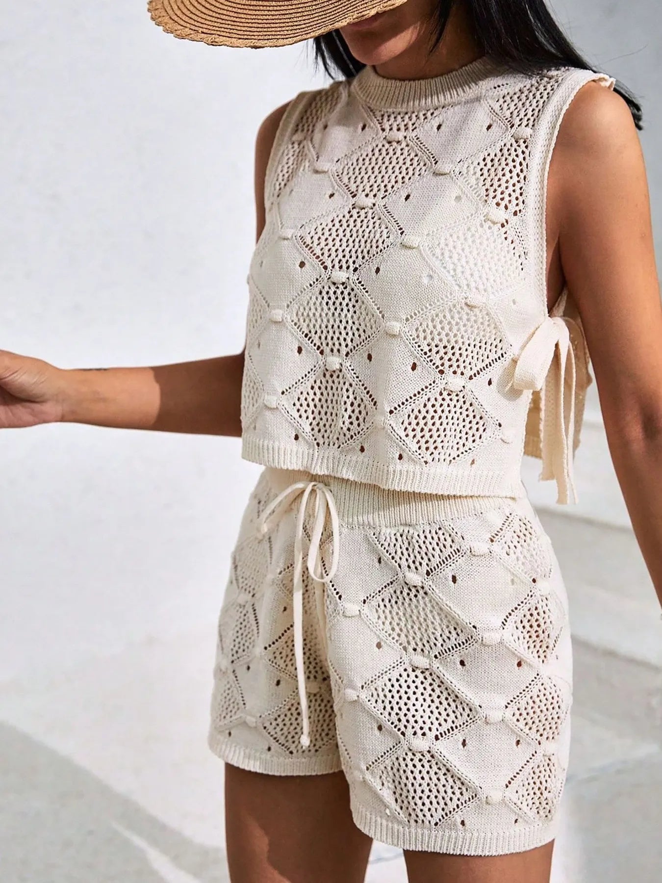 Apricot diamond-pattern knit sleeveless top paired with drawstring shorts