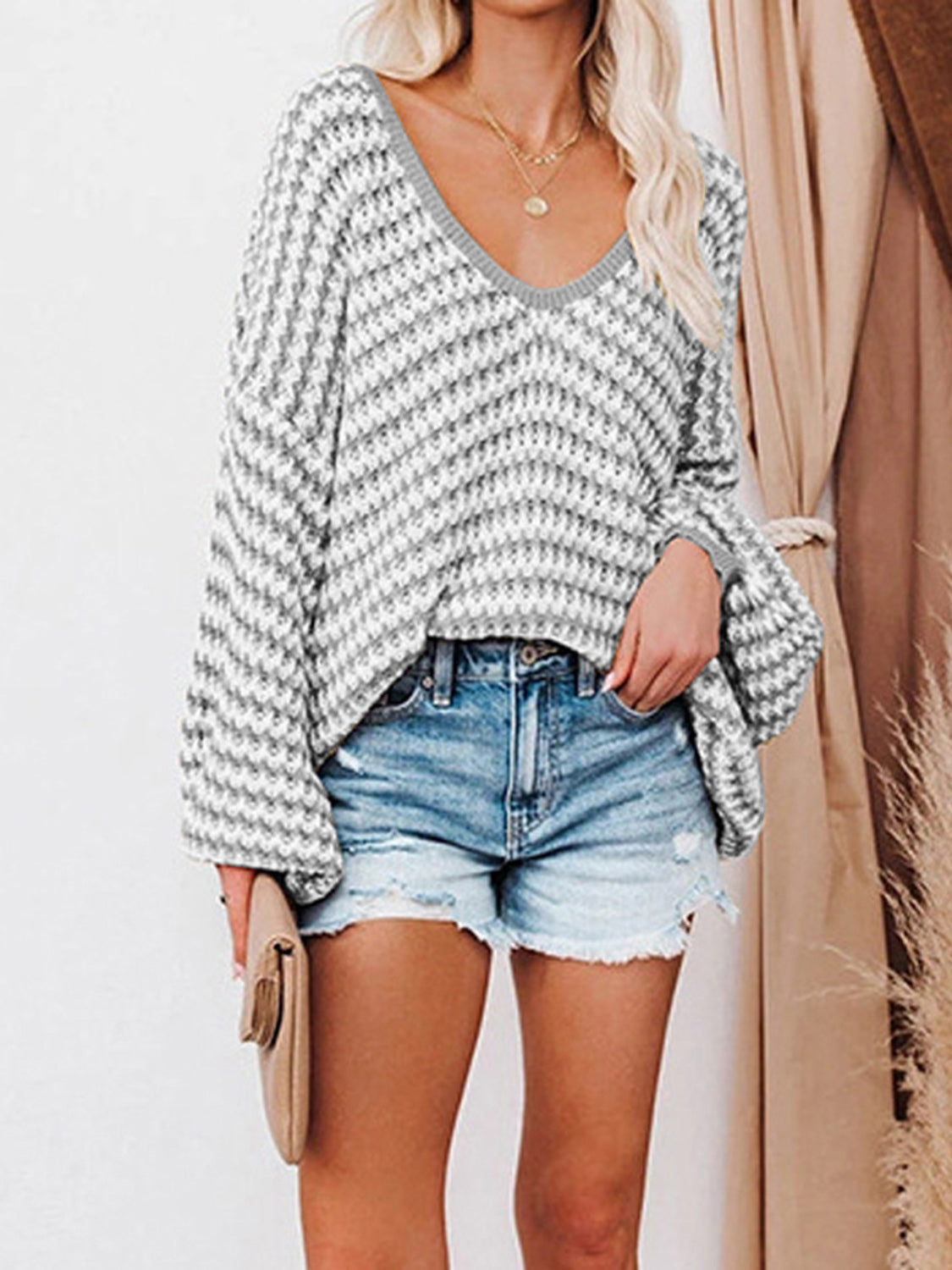 Striped drop-shoulder V-neck sweater, gray with white knit texture and long sleeves