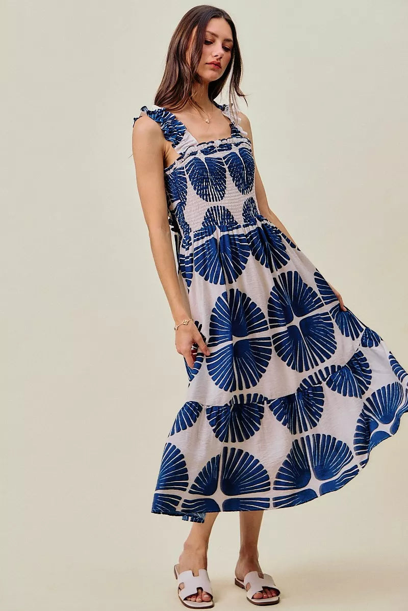 Navy and white abstract print tiered midi dress with smocked bodice and full skirt