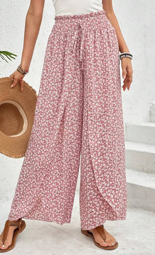 Blush pink floral printed wide-leg pants with elastic waist and side slit