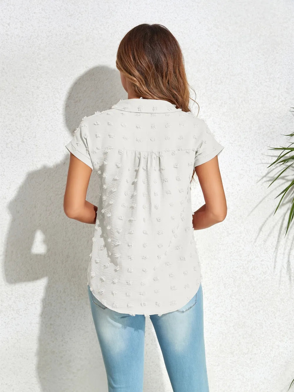 White swiss-dot cap-sleeve shirt with back yoke pleats