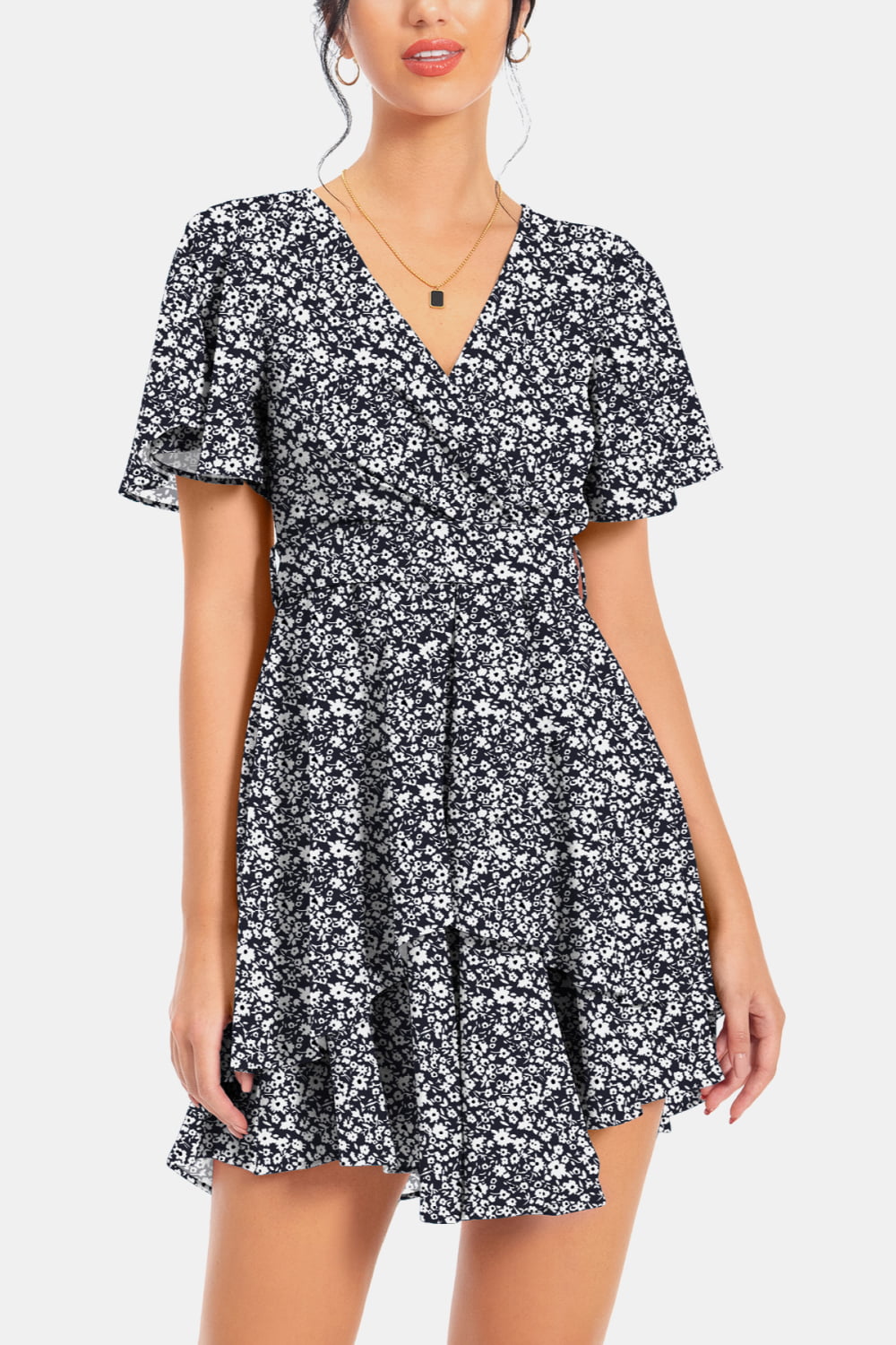 Black-and-white floral surplice mini dress with flutter sleeves and gathered skirt