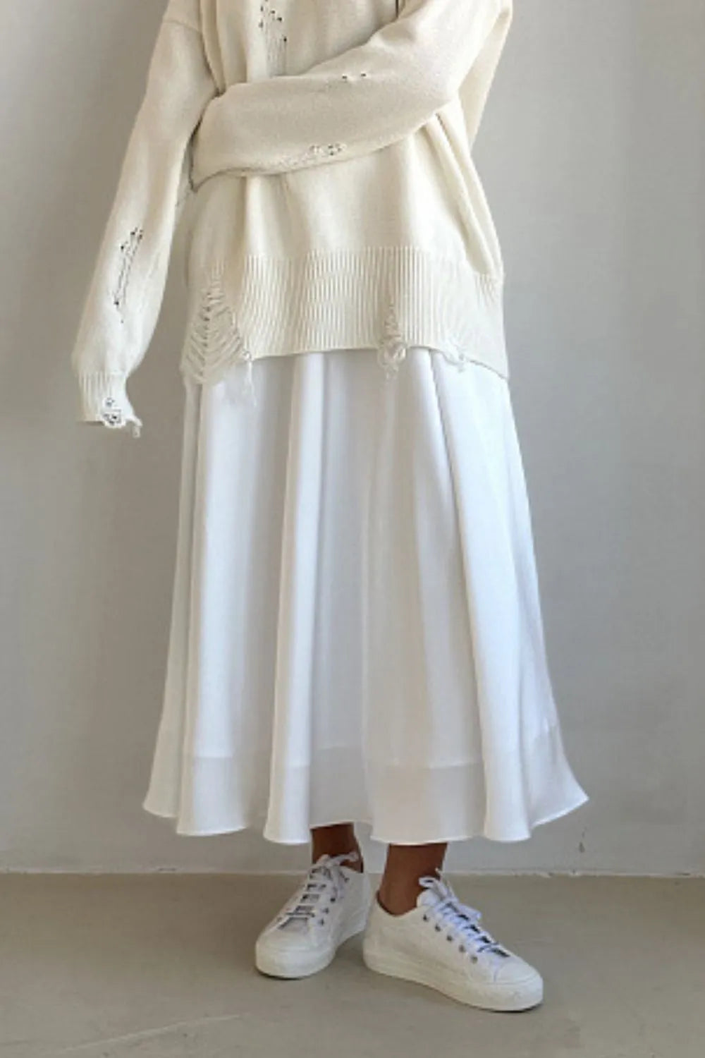 White satin midi skirt with elastic back waist, soft gathers and flared hem