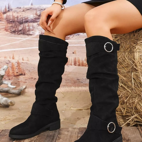 Black block heel boots with circular buckle details and wide strap