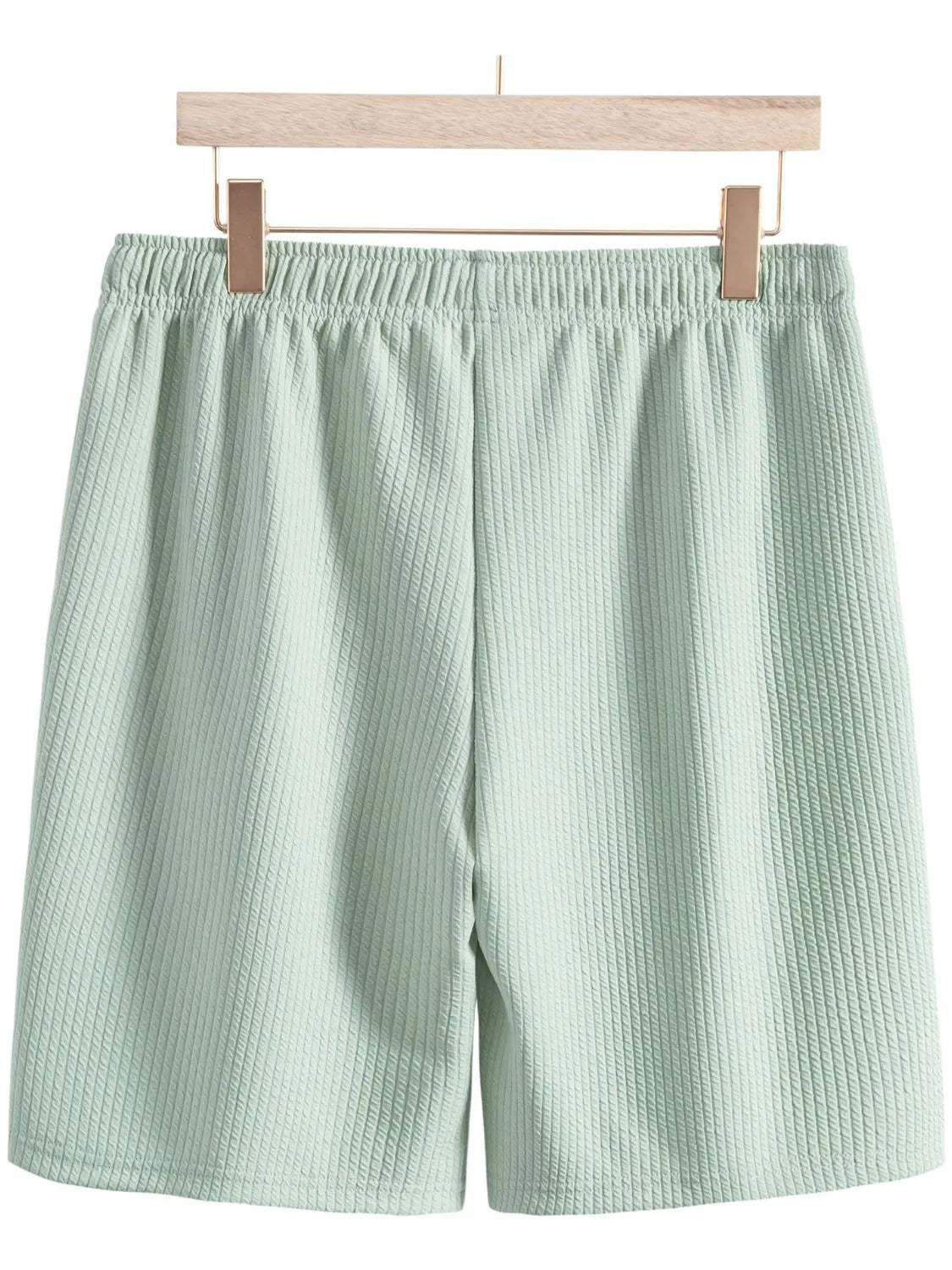 Mint green ribbed elastic waist shorts, back view