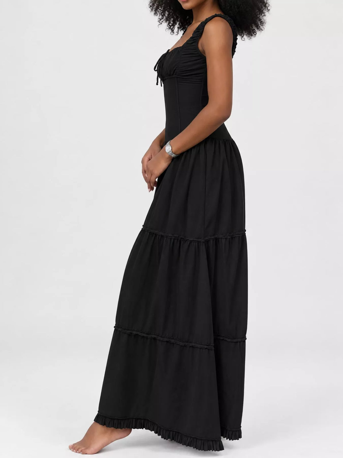 Black square-neck tiered maxi dress with sleeveless straps and tiered skirt ruffles