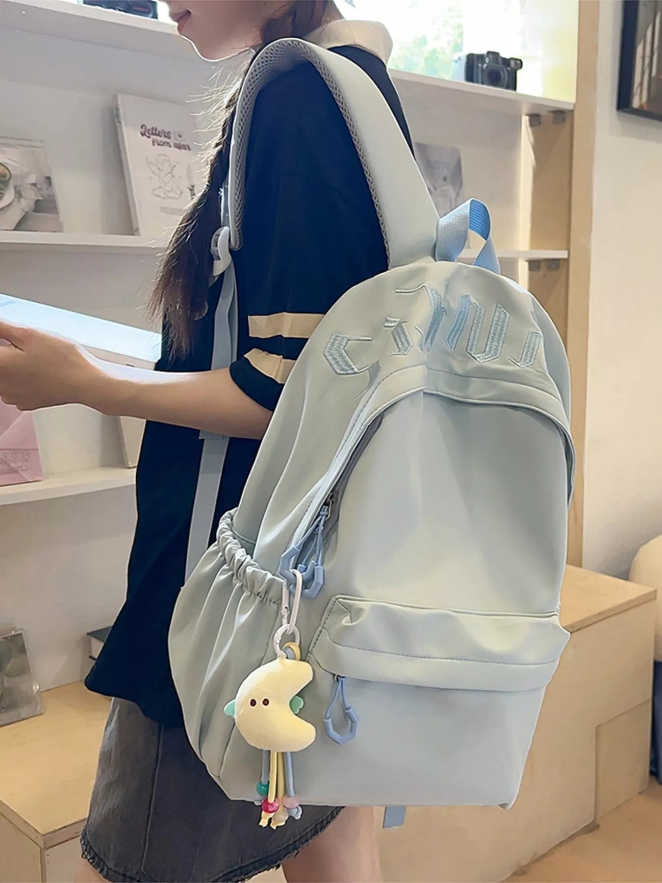 Cedar & Moore Embroidered Letter Backpack Bag by Trendsi, light blue, medium size