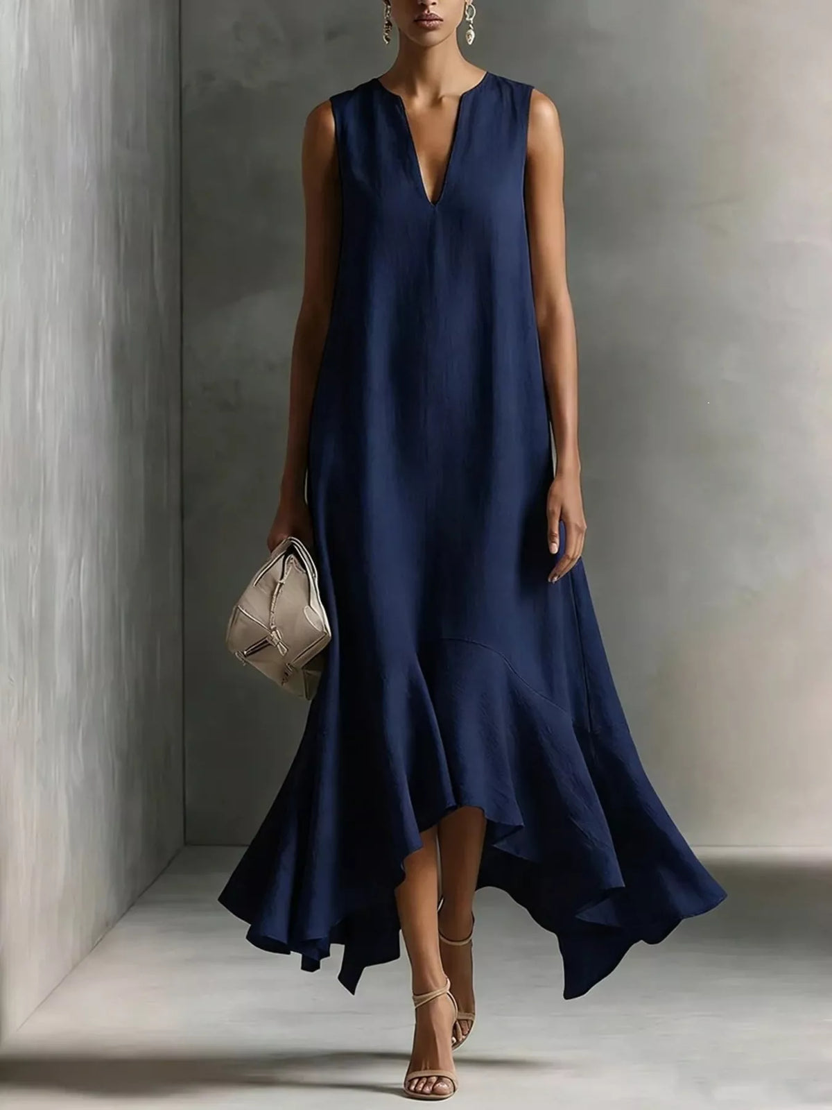 Dark blue sleeveless summer dress with V-neckline and ruffled high-low hem