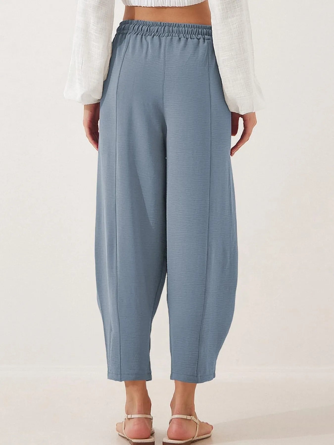 Light blue drawstring wide-leg cropped pants with gathered elastic waist