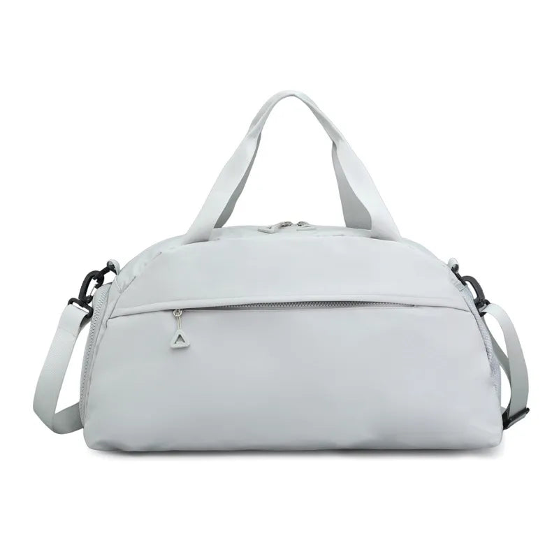 Large nylon travel duffle bag, light gray with front zip pocket and shoulder straps