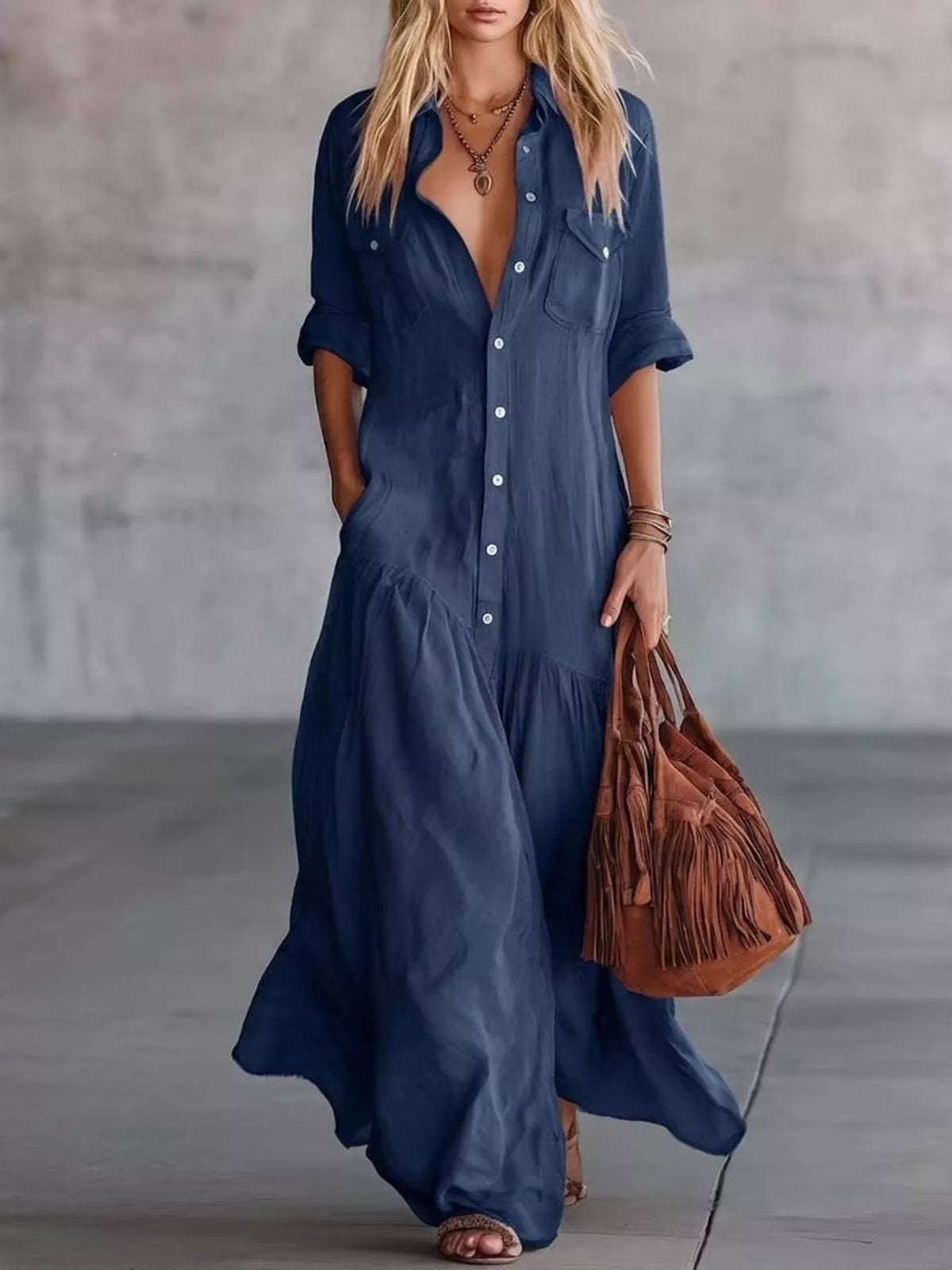 Dark blue maxi shirt dress with button front, short sleeves, and side pockets
